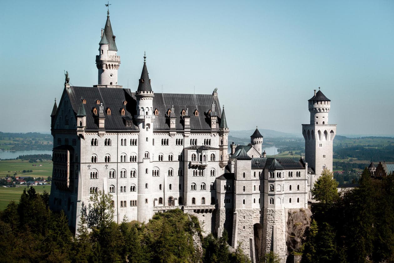 Neuschwanstein Castle is Germany's most photographed and popular fairytale castle. Keep reading for a complete guide to visiting Neuschwanstein Castle including photos, how to get there from Munich, how to buy tickets and more. 