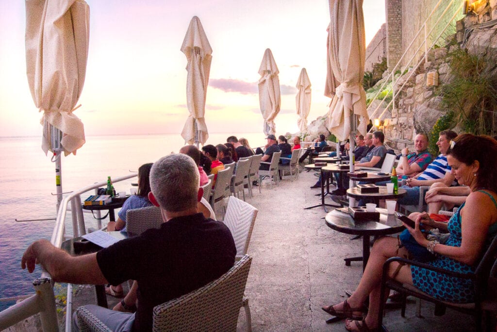 People sitting at Buza Bar in Dubrovnik, Croatia 