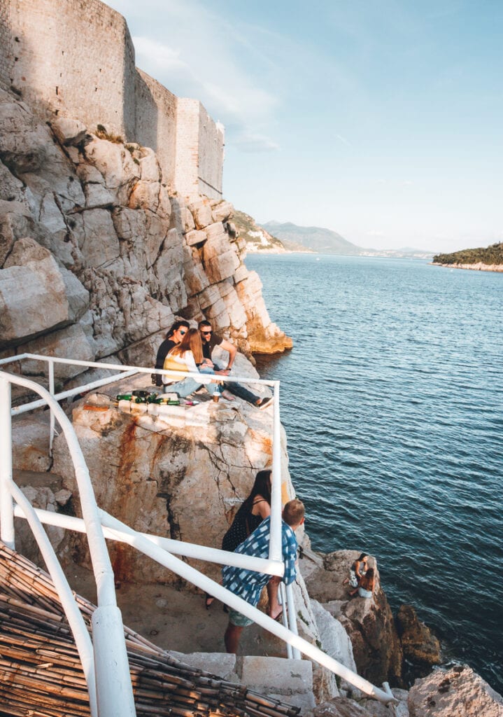 People sitting on the Dubrovnik cliffs